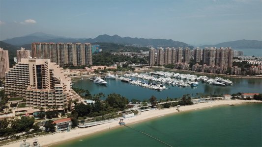 非本地專才買樓退稅措施刺激 內地客加快入市 屯門黃金海岸685實呎戶566萬元易手 買家先繳3成「辣稅」 2012年貨升值1.1倍